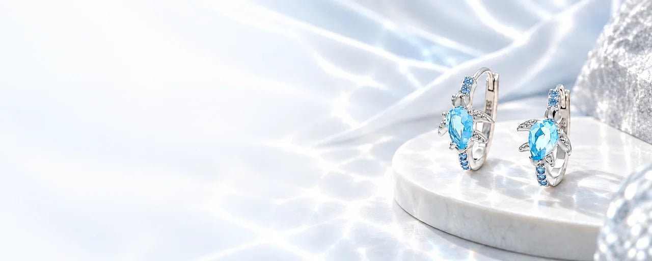 Silver jewelry in soft blue light